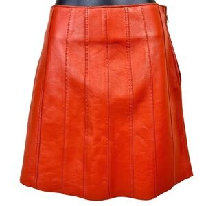 Sandro Aubin Seamed Leather Mini Skirt In Caramel